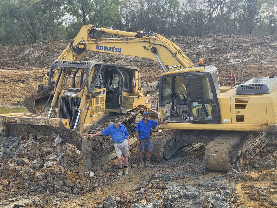 Tyrone and his dad on a bushland dam job — two generations of Dino Earthworx